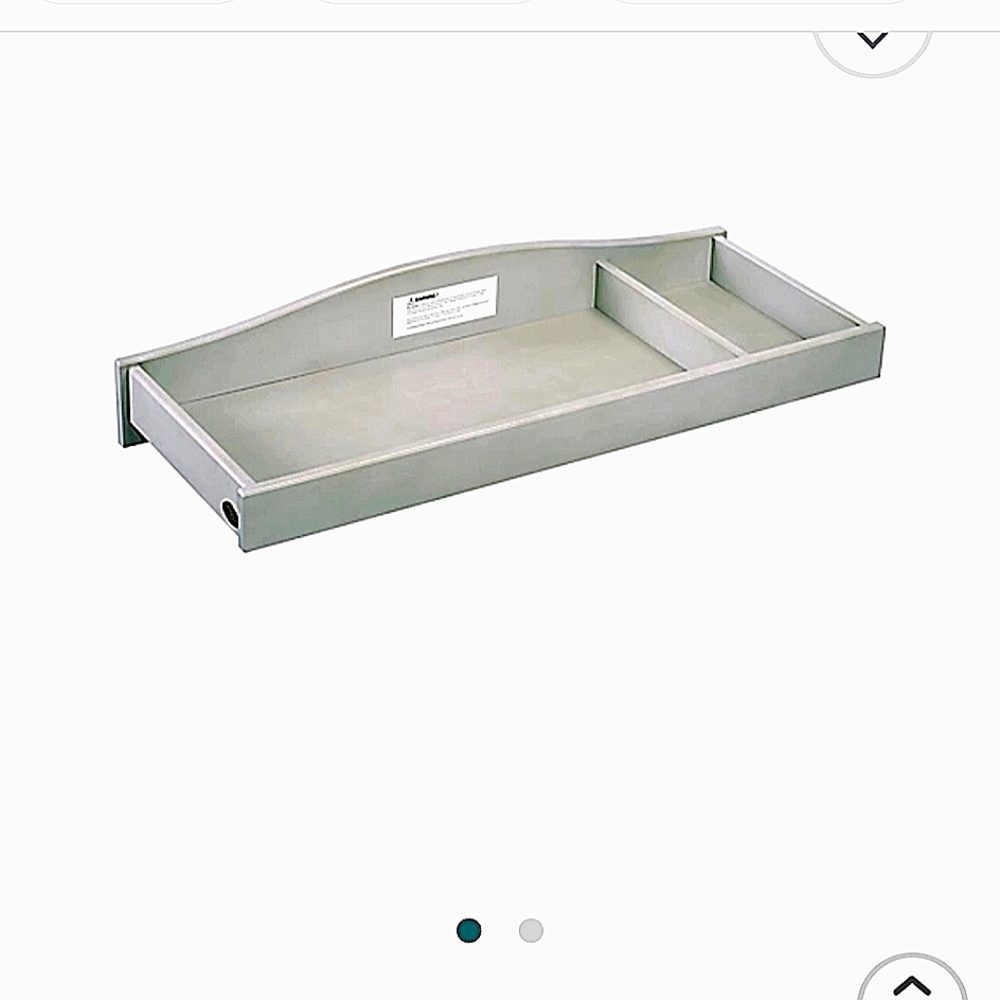 Brand new still in the box Baby Cache changing table. Grey in color.